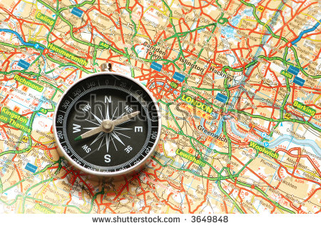 stock-photo-compass-over-the-map-of-uk-london-suburbs-3649848